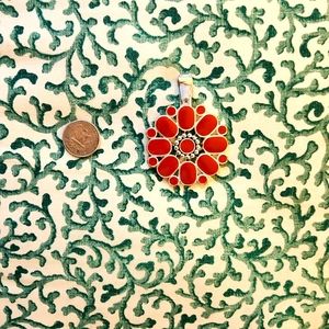 Reversible red and turquoise on silver pendant.